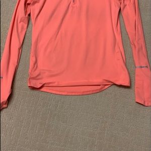 Nike dri fit pullover this is peach in color